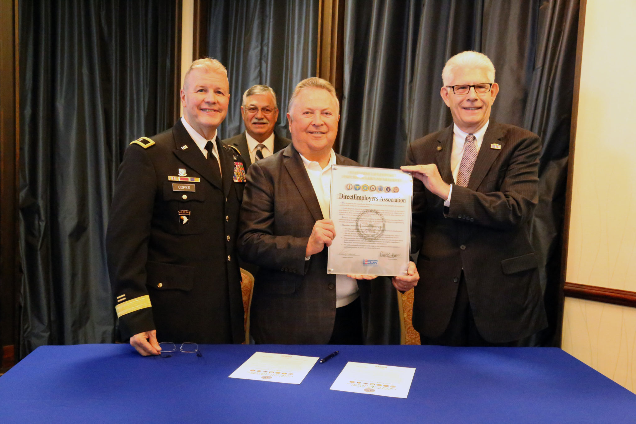 Former Executive Director Bill Warren with representatives from the ESGR after MOU Signing